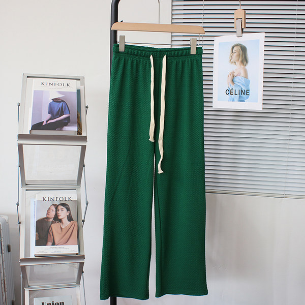 Široke ravne ženske sportske hlače na vezanje