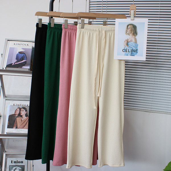 Široke ravne ženske sportske hlače na vezanje