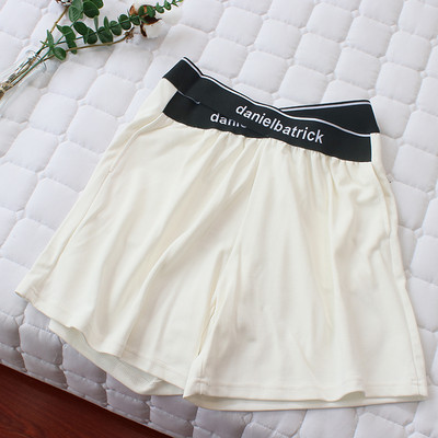 Γυναικείο αθλητικό σορτς με λάστιχο στη μέση και επιγραφή