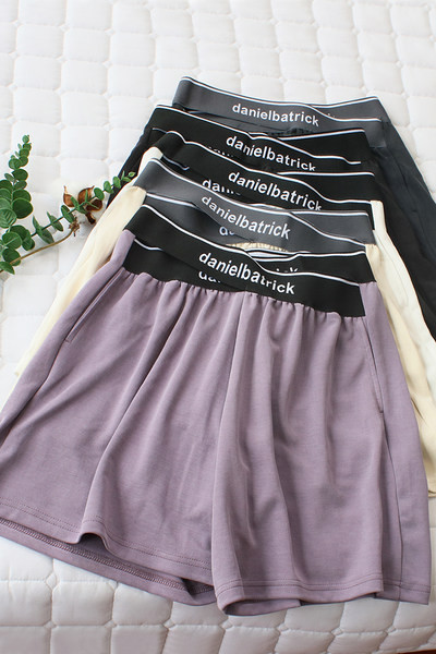 Γυναικείο αθλητικό σορτς με λάστιχο στη μέση και επιγραφή