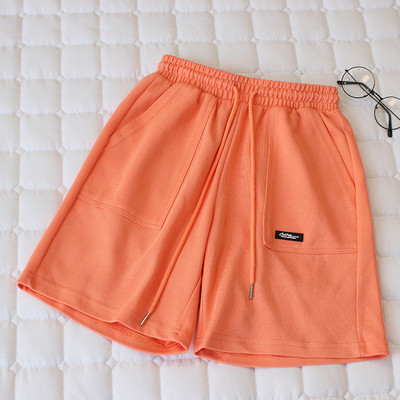 Embleemiga suvised vabaaja spordipüksid naistele