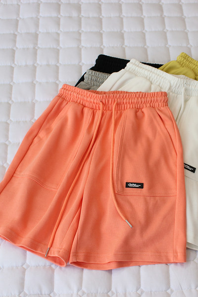 Embleemiga suvised vabaaja spordipüksid naistele