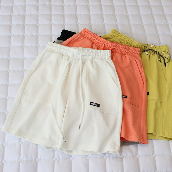 Embleemiga suvised vabaaja spordipüksid naistele