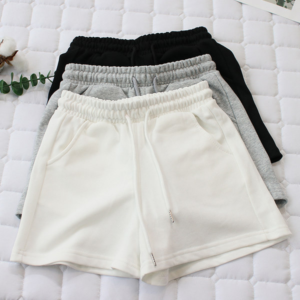 Naiste spordipüksid lipsude ja taskutega