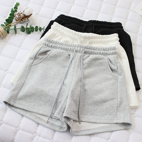 Naiste spordipüksid lipsude ja taskutega