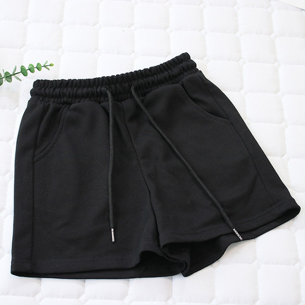 Naiste spordipüksid lipsude ja taskutega