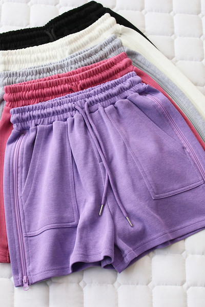 Naiste spordipüksid luku ja lipsudega