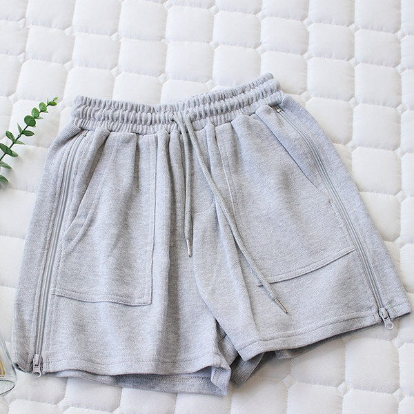 Naiste spordipüksid luku ja lipsudega