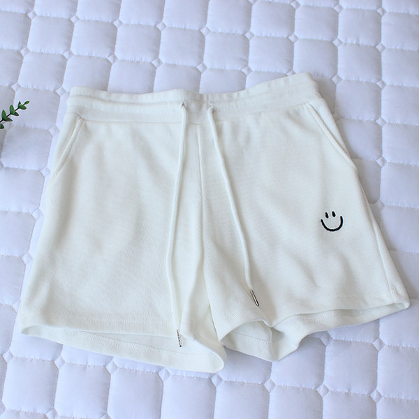 Lühikesed tikandiga spordi- ja vabaaja lühikesed püksid