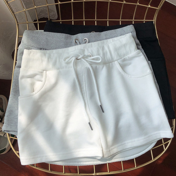 Suvised puuvillased lipsudega spordipüksid