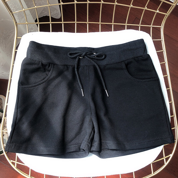 Suvised puuvillased lipsudega spordipüksid