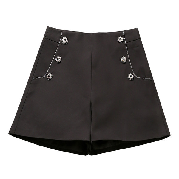 Dekoratiivsete nööpidega naiste lühikesed püksid