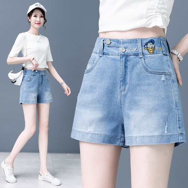 Tikitud aplikatsiooniga naiste teksapüksid