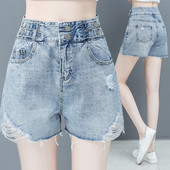 Γυναικείο σορτς με σκισμένα μοτίβα - μπλε χρώμα