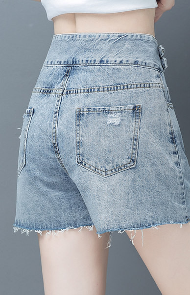 Γυναικείο σορτς με σκισμένα μοτίβα - μπλε χρώμα