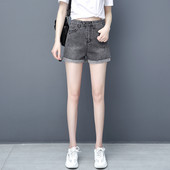 Γυναικείο κοντό τζιν με ασύμμετρο κούμπωμα