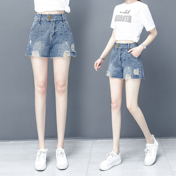 Γυναικείο κοντό τζιν με σκισμένα μοτίβα