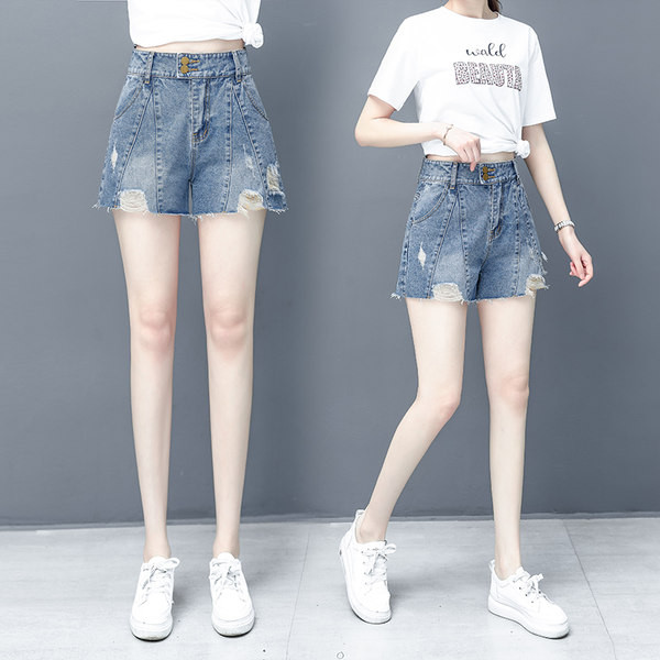 Γυναικείο κοντό τζιν με σκισμένα μοτίβα