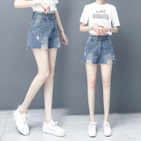 Γυναικείο κοντό τζιν με σκισμένα μοτίβα