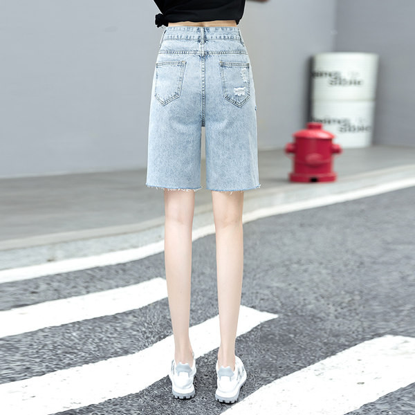 Naiste kõrge vöökoha ja nööpkinnitusega teksapüksid