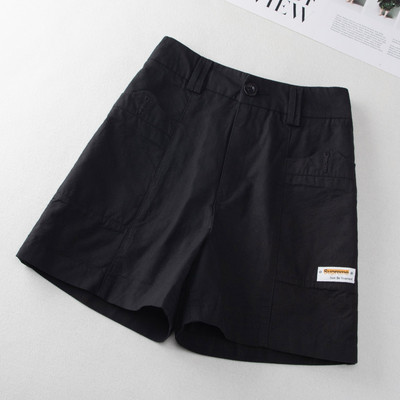 Taskute ja embleemiga vabaajapüksid