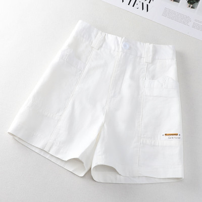 Taskute ja embleemiga vabaajapüksid