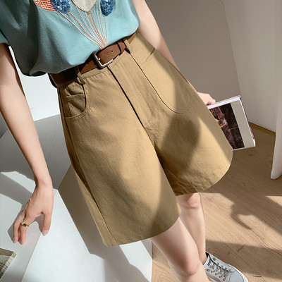 Naiste lühikesed püksid kõrge vöökoha ja taskutega