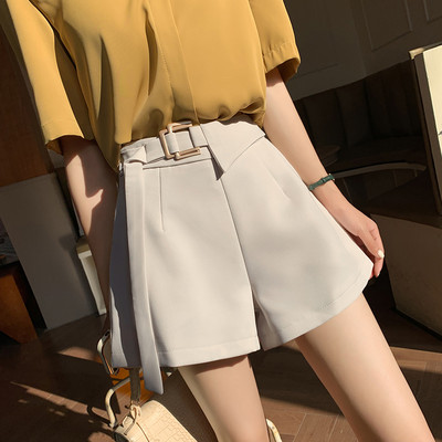 Κομψό παντελόνι με ζώνη και ψηλή μέση για γυναίκες