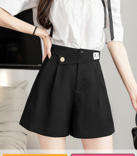 Γυναικείο φαρδύ παντελόνι με ασύμμετρο κούμπωμα