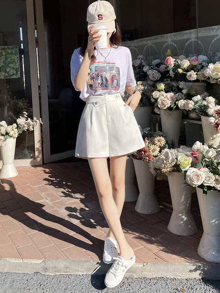 Γυναικείο φαρδύ παντελόνι με ασύμμετρο κούμπωμα