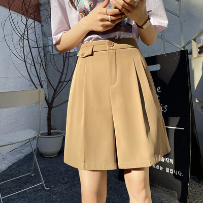 Laiad kõrge vöökoha ja taskutega naiste lühikesed püksid