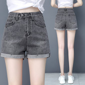 Naistele kõrge vöökoha ja nööpidega teksapüksid