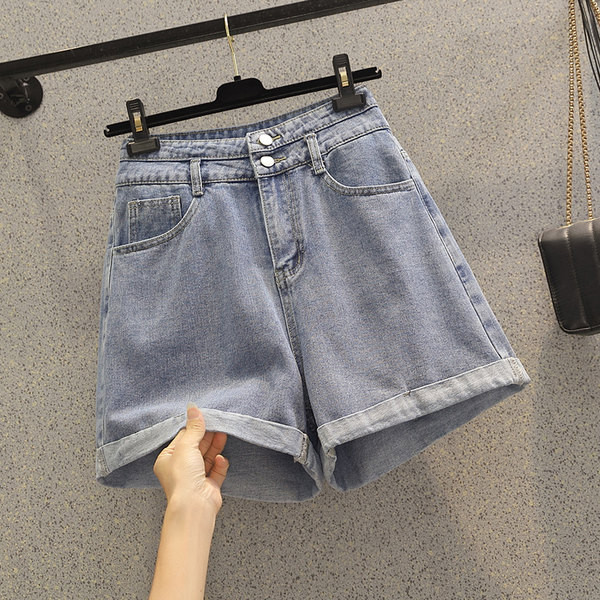 Kõrge vöökohaga nööpidega teksapüksid