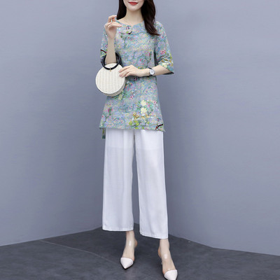 Naiste kaheosaline komplekt ovaalse kaelusega ja 3/4 varrukatega