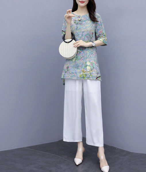 Naiste kaheosaline komplekt ovaalse kaelusega ja 3/4 varrukatega