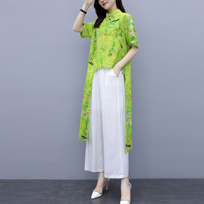 Uue mudeli naiste komplekt kahest osast - asümmeetriline pluus ja püksid