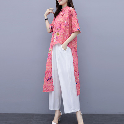 Uue mudeli naiste komplekt kahest osast - asümmeetriline pluus ja püksid