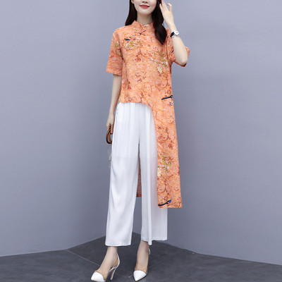 Uue mudeli naiste komplekt kahest osast - asümmeetriline pluus ja püksid