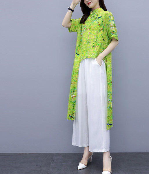 Uue mudeli naiste komplekt kahest osast - asümmeetriline pluus ja püksid