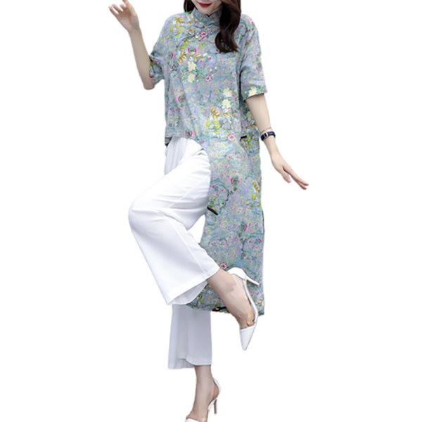 Uue mudeli naiste komplekt kahest osast - asümmeetriline pluus ja püksid