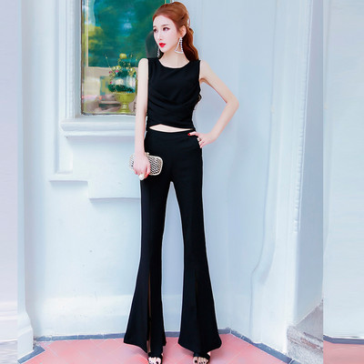 Moodne naiste komplekt kahest osast - topp ja lõhikutega püksid