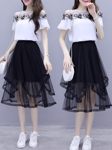 Ženski komplet od dva dijela suknja i bluza sa kratkim rukavima i vezom