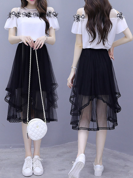 Ženski komplet od dva dijela suknja i bluza sa kratkim rukavima i vezom