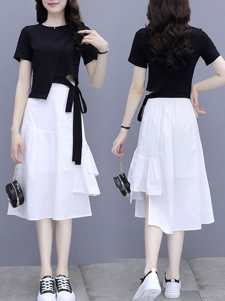 Naiste komplekt kaheosalisest pluusist ja seelikust