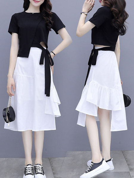 Naiste komplekt kaheosalisest pluusist ja seelikust