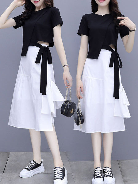 Naiste komplekt kaheosalisest pluusist ja seelikust