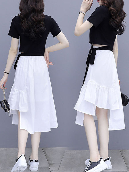 Naiste komplekt kaheosalisest pluusist ja seelikust