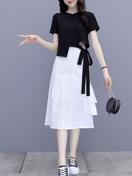 Naiste komplekt kaheosalisest pluusist ja seelikust