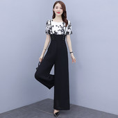 Ženski kombinezon kratkih rukava u crnoj boji