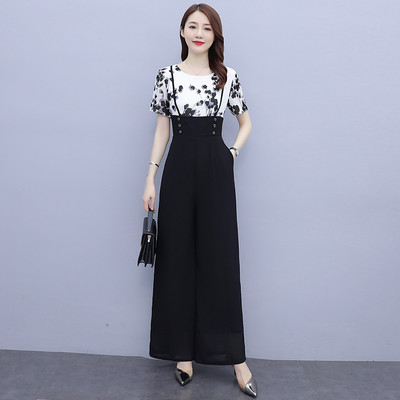 Ženski kombinezon kratkih rukava u crnoj boji